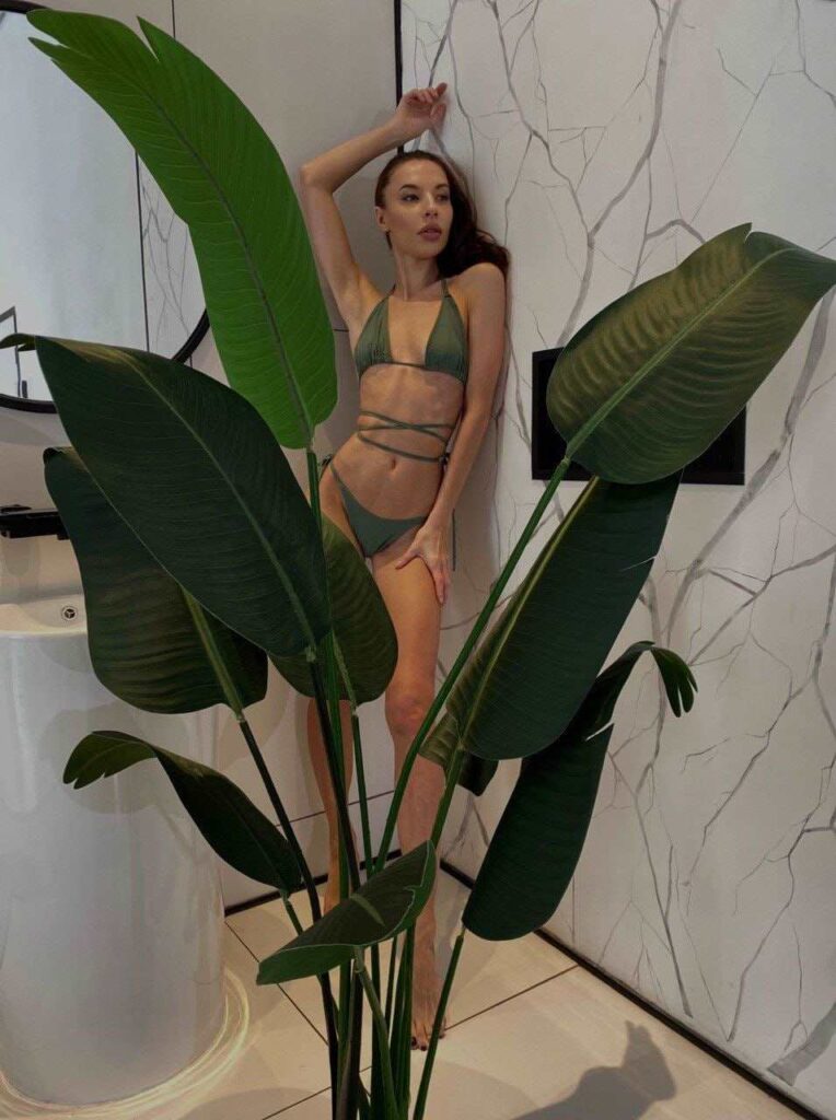 Darina-in-green-lingerie-by-the-bush